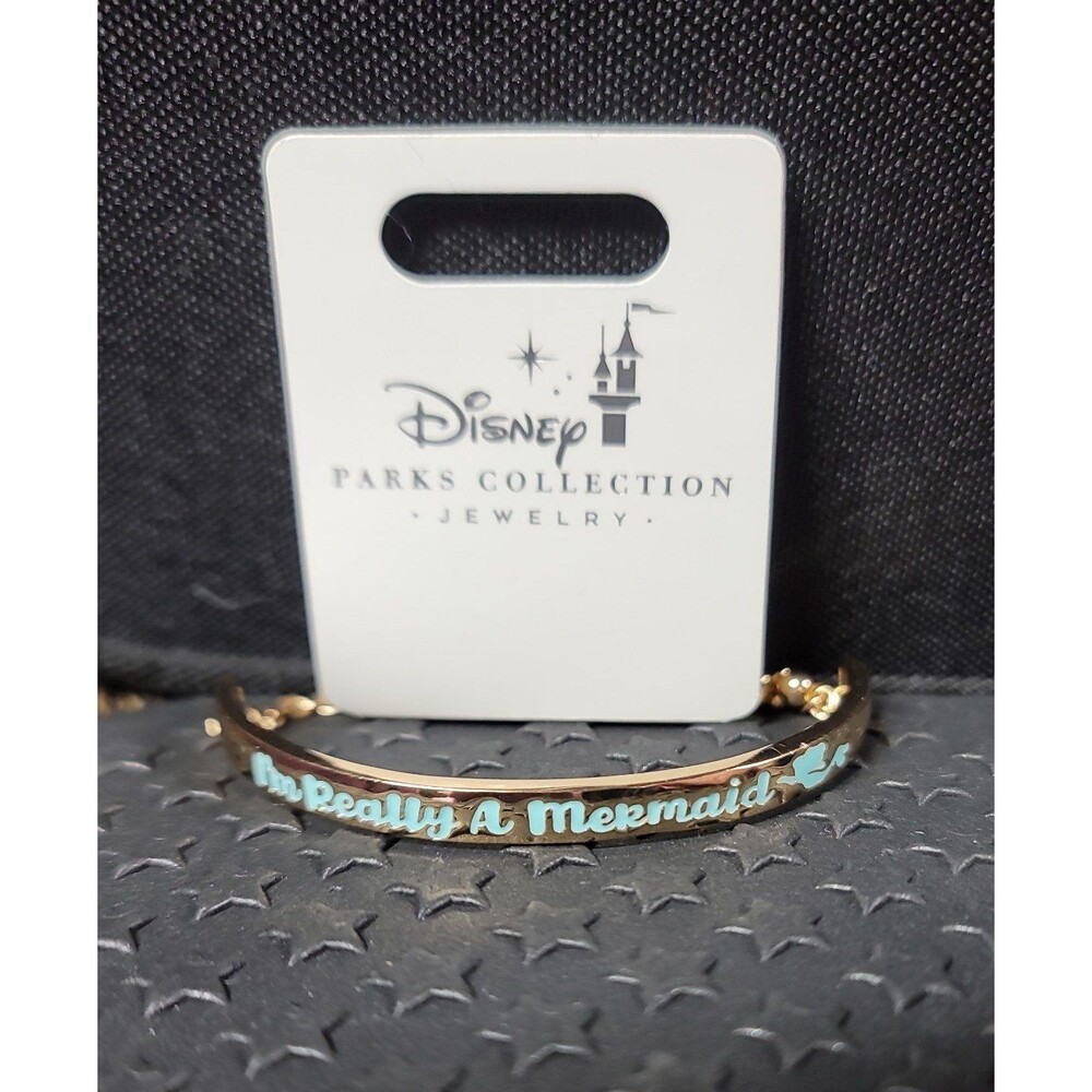 Disney Parks exclusive Ariel,  "I am really a Mermaid " gold tone bracelet